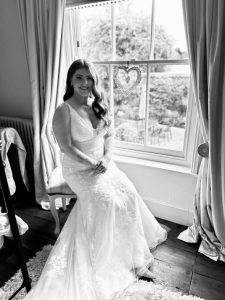 Real Bride Rikki wearing a divine fitted lace wedding dress