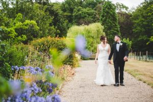 Hannah-Mai in deep v-neckline fitted lace gown